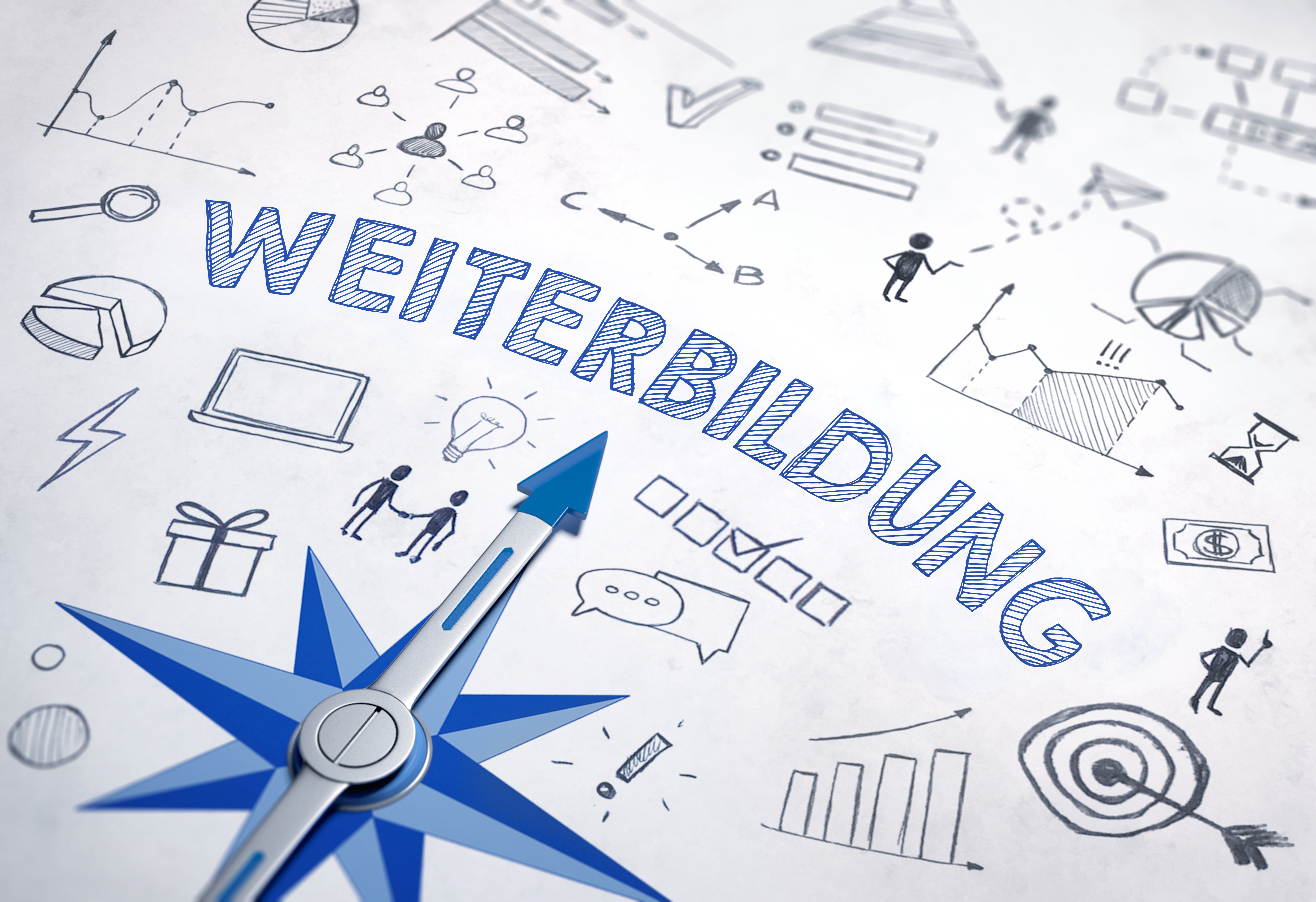 Kompass zeigt auf WEITERBILDUNG