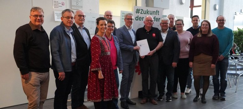 Das Bild zeigt ein Gruppenfoto der Projektteilnehmerinnen und -teilnehmer