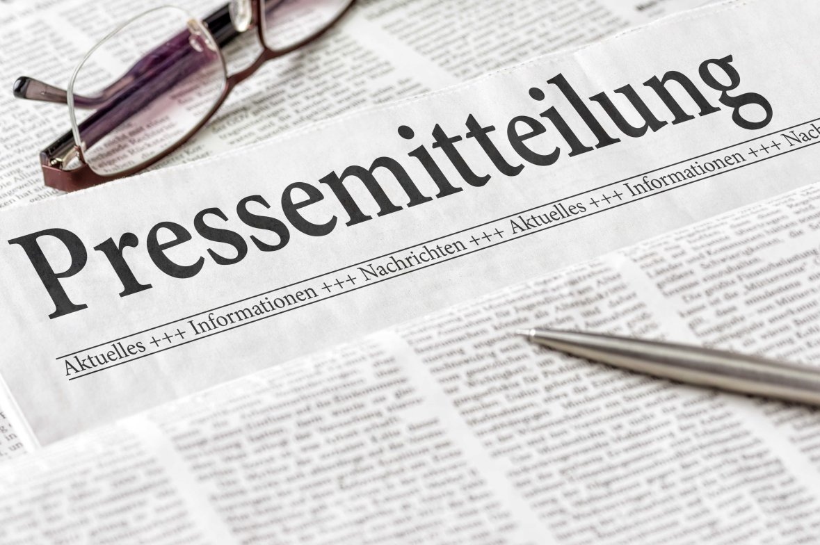 Zeitung mit der Überschrift Pressemitteilung Zeitung mit der Überschrift Pressemitteilung