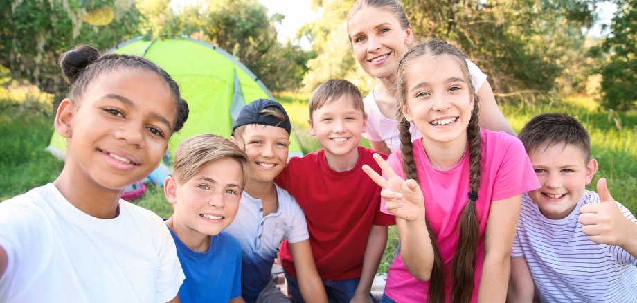 Group of children taking selfie at summer camp Group of children taking selfie at summer camp